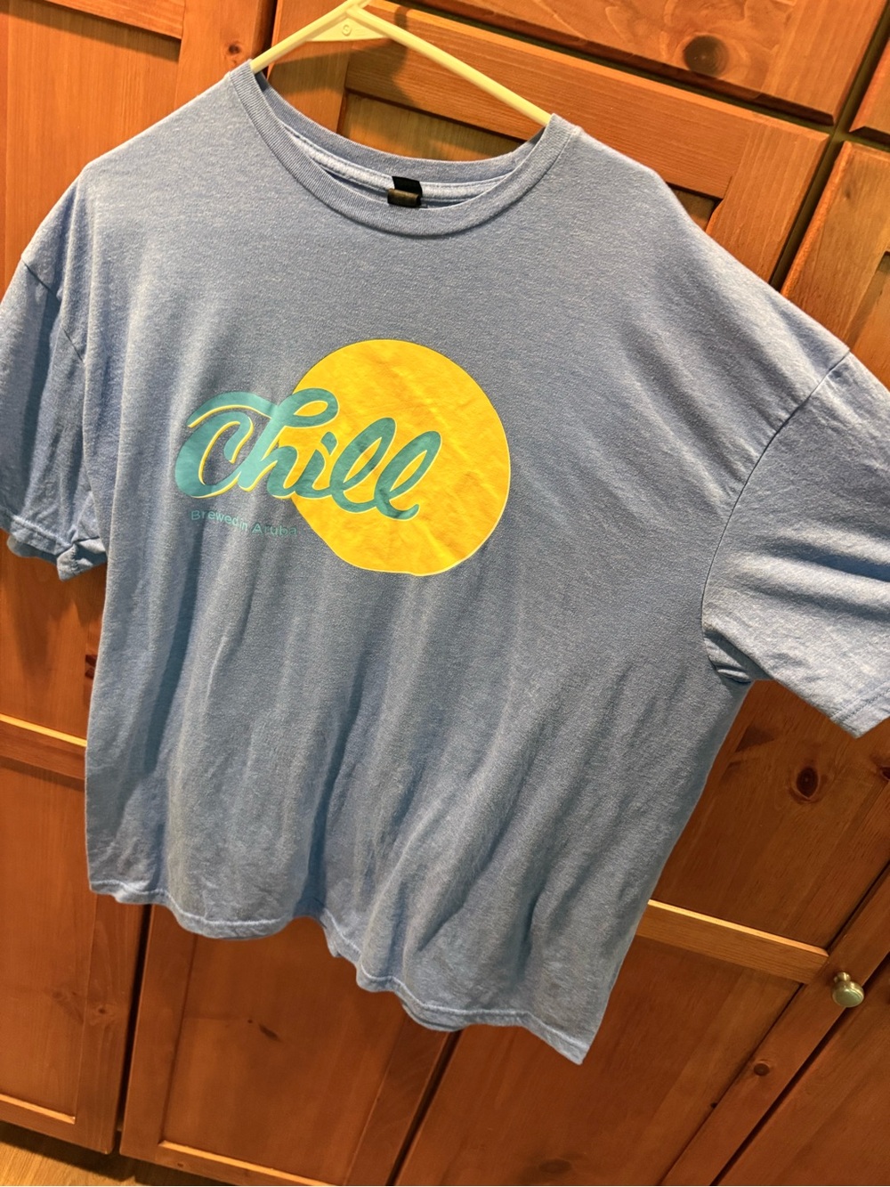 Chill Graphic Tee in Light Blue with Yellow Sun from Aruba